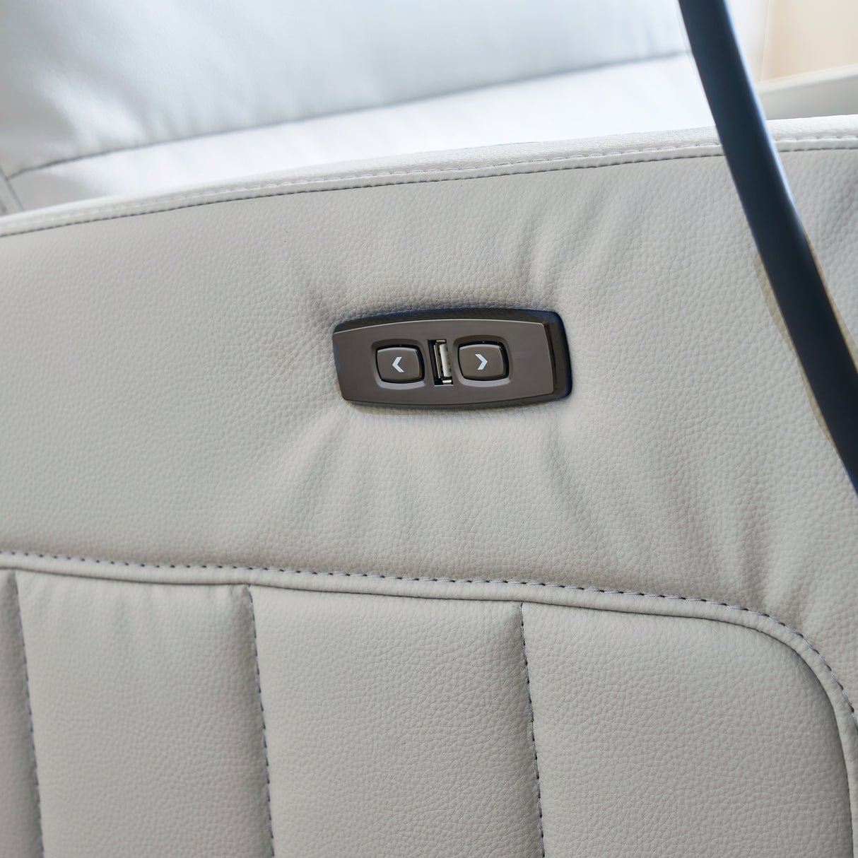 Close-up of Airsky Recliner power control buttons, easy reclining adjustment with USB charging port